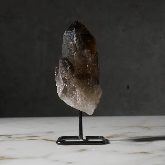 smoky quartz on a stand